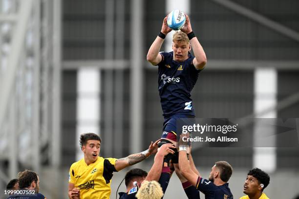 Fabian Holland of the Highlanders collects the ball from a lineout during the Super Rugby Pacific Pre-Season match between Highlanders and Hurricanes...
