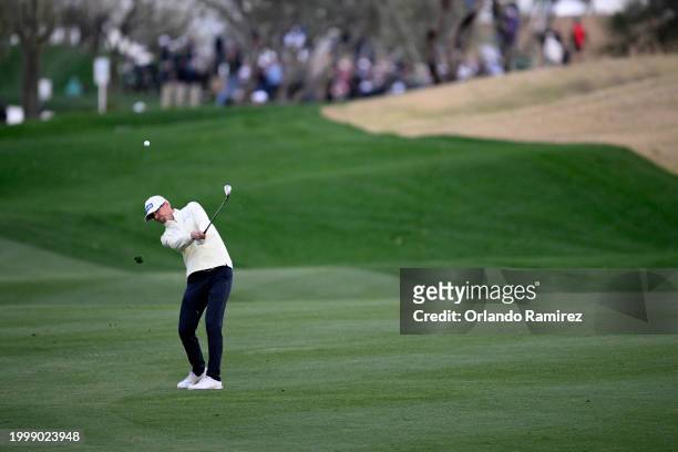 Jim Knous of the United States plays an approach shot on the third hole during the second round of the WM Phoenix Open at TPC Scottsdale on February...