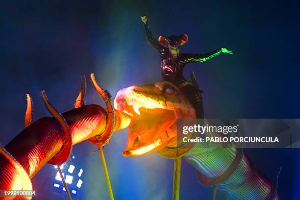 Member of the Unidos do Viradouro samba school performs during the last night of the Carnival parade at the Marques de Sapucai Sambadrome in Rio de...