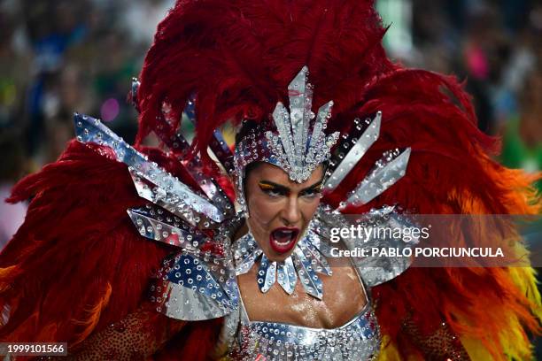 Member of the Unidos do Viradouro samba school performs during the last night of the Carnival parade at the Marques de Sapucai Sambadrome in Rio de...