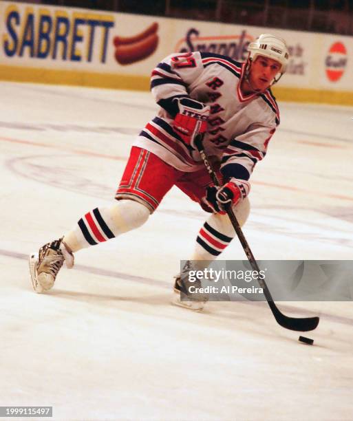 Left Wing Alexi Kovalev of the New York Rangers handles the puck in the game between the Chicago Black Hawks vs the New York Rangers at Madison...