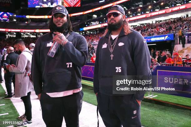 Lucas Niang and Darian Kinnard of the Kansas City Chiefs speak to media during Super Bowl LVIII Opening Night at Allegiant Stadium ahead of Super...