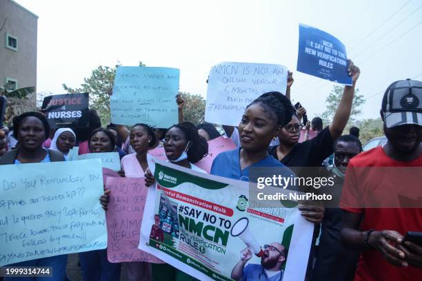 Nurses and Midwives, conduct their protest against the Federal Government's new verification certification guideline in Abuja., Nigeria, on February...