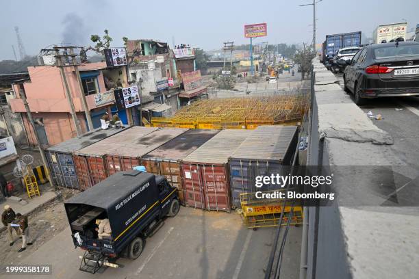 Barricades erected by the police on a road in Ghazipur on the outskirts of New Delhi, India, on Tuesday, Feb. 13, 2024. Police in Delhi and the...