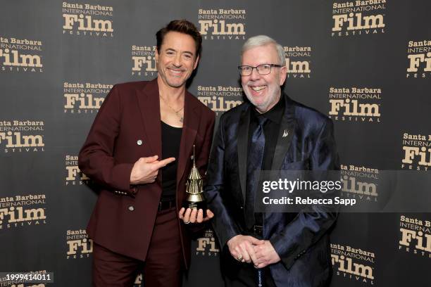 Honoree Robert Downey Jr. And Leonard Maltin pose with the Maltin Modern Master Award during the 39th Annual Santa Barbara International Film...