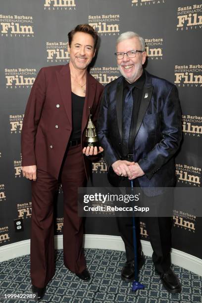 Honoree Robert Downey Jr. And Leonard Maltin pose with the Maltin Modern Master Award during the 39th Annual Santa Barbara International Film...