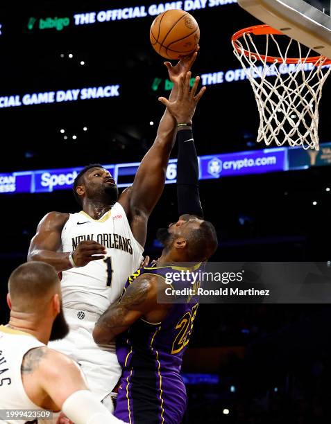 Zion Williamson of the New Orleans Pelicans takes a shot against LeBron James of the Los Angeles Lakers in the second half at Crypto.com Arena on...