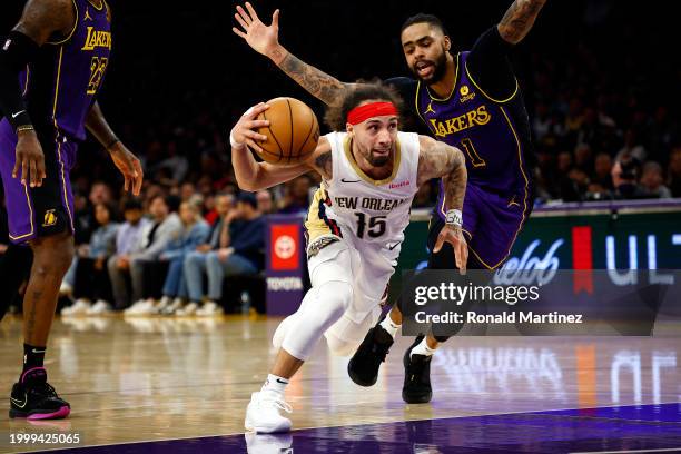 Jose Alvarado of the New Orleans Pelicans controls the ball against D'Angelo Russell of the Los Angeles Lakers in the second half at Crypto.com Arena...