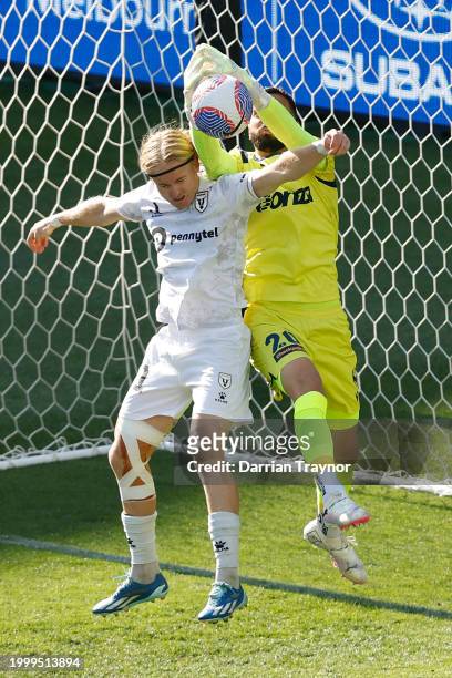 Paul Izzo of Melbourne Victory defends the goal from Lachlan Rose of Macarthur F.C. During the A-League Men round 16 match between Melbourne Victory...