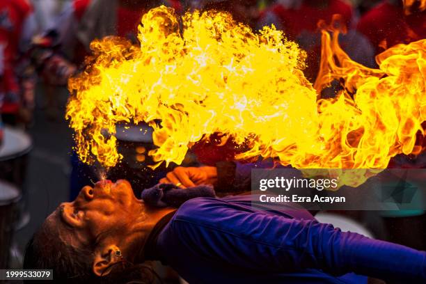 Performer breathes fire during Lunar New Year celebrations at Binondo district, considered the world's oldest Chinatown, on February 10, 2024 in...