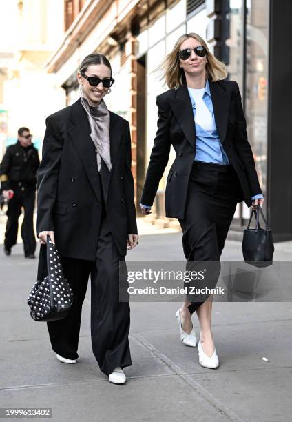 Madeline Harper Fass and Lisa Siken are seen outside the Helmut Lang show during NYFW F/W 2024 on February 09, 2024 in New York City.