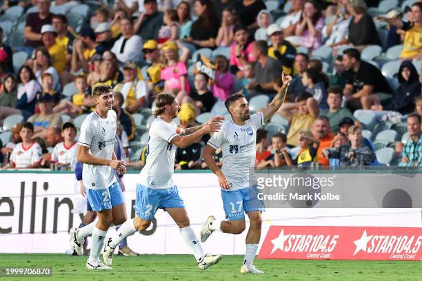 Anthony Caceres of Sydney FC celebrates with team mates after scoring a goal during the A-League Men round 16 match between Central Coast Mariners...