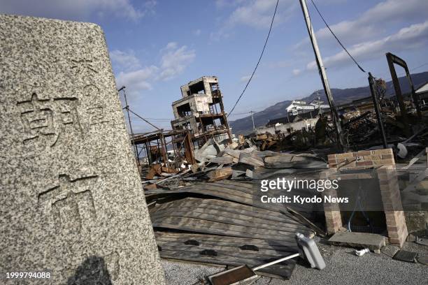 The site of a gutted market in Wajima in Ishikawa Prefecture, central Japan, is pictured on Feb. 13 after a blaze broke out following a strong...