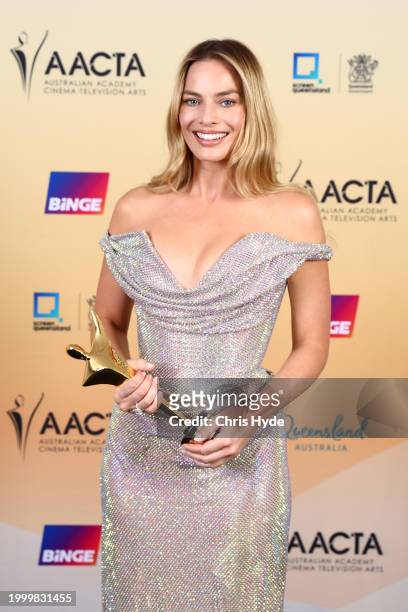 Margot Robbie poses with the AACTA Trailblazer Award during the 2024 AACTA Awards Presented By Foxtel Group at HOTA on February 10, 2024 in Gold...