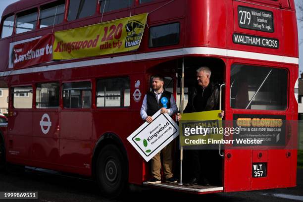 Sam Bromiley, the Conservative candidate for Kingswood and Lee Anderson, MP for Ashfield on the Routemaster bus which they arrived in, on February...