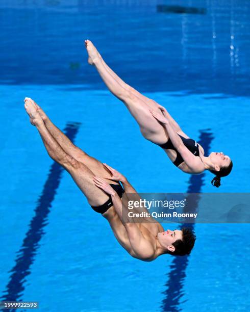 Noah Duperre and Bridget O'Neil of Team United States compete in the Mixed Synchronized 3m Springboard Final on day nine of the Doha 2024 World...