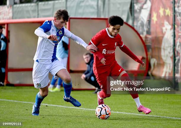 Trent Kone-Doherty of Liverpool and Jackson Shorrocks of Blackburn Rovers in action during the U18 Premier League game at AXA Training Centre on...