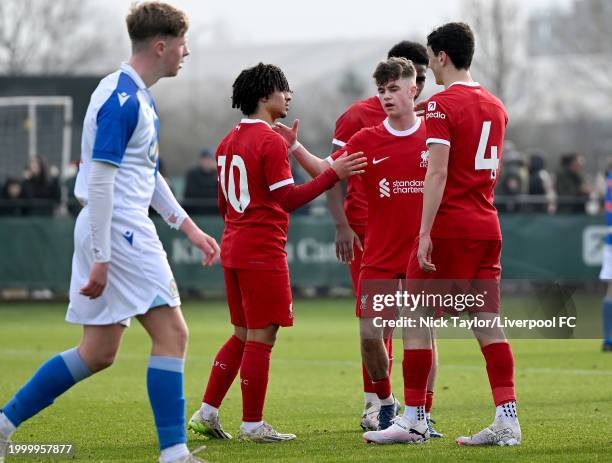 Kareem Ahmed of Liverpool celebrates scoring Liverpool's second goal with his team mates during the U18 Premier League game at AXA Training Centre on...