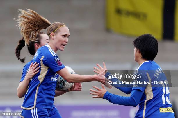 Janice Cayman of Leicester City celebrates scoring her team's first goal with teammates during the Adobe Women's FA Cup Fifth Round match between...
