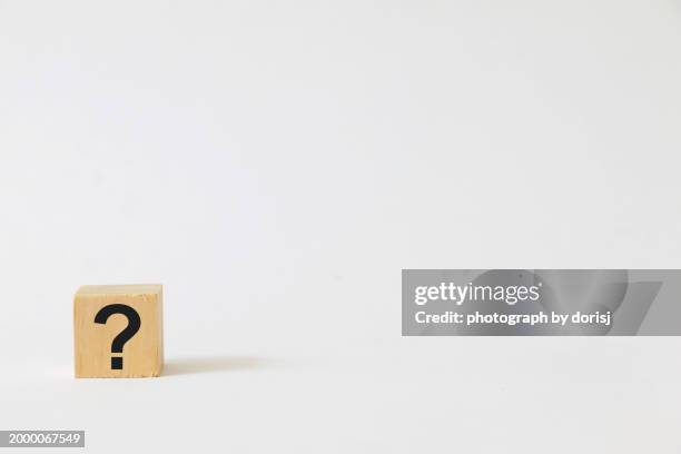 Question Mark On Wooden Block High-Res Stock Photo - Getty Images