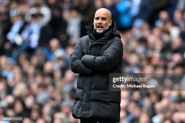 Pep Guardiola, Manager of Manchester City, reacts during the Premier League match between Manchester City and Everton FC at Etihad Stadium on...