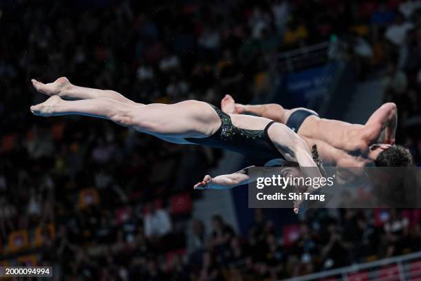 Domonic Bedggood and Maddison Keeney of Team Australia compete in the Mixed Synchronized 3m Springboard Final on day nine of the Doha 2024 World...