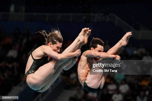 Domonic Bedggood and Maddison Keeney of Team Australia compete in the Mixed Synchronized 3m Springboard Final on day nine of the Doha 2024 World...