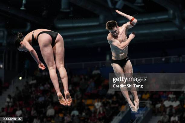 Jake Passmore and Clare Cryan of Team Republic of Ireland compete in the Mixed Synchronized 3m Springboard Final on day nine of the Doha 2024 World...