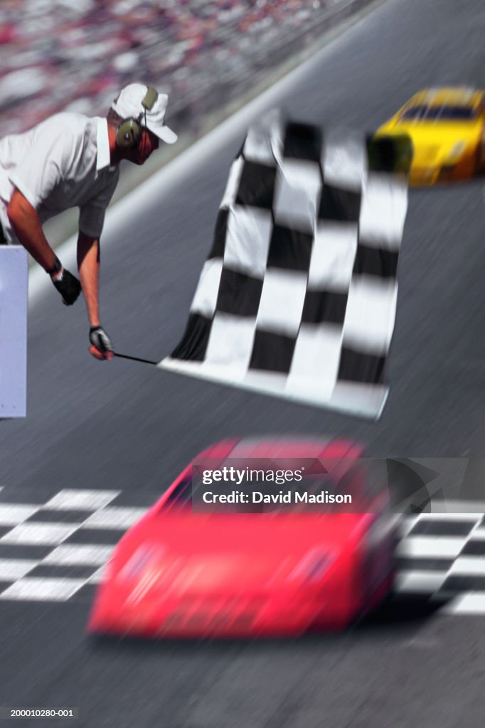 Staggering Racing Flags Race Official Waving Checkered Flag Above Race Car High-Res Stock Photo ...