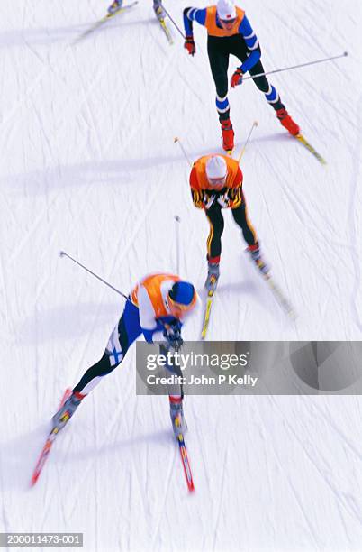 cross country racers, elevated view - cross country skiing stock pictures, royalty-free photos & images