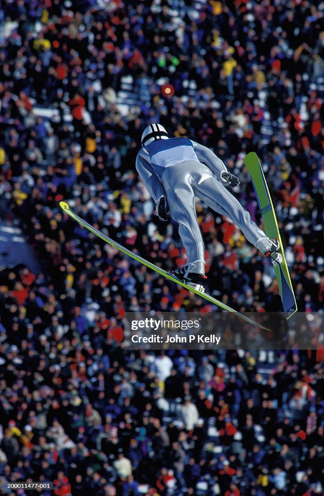 Ski jumper in mid air