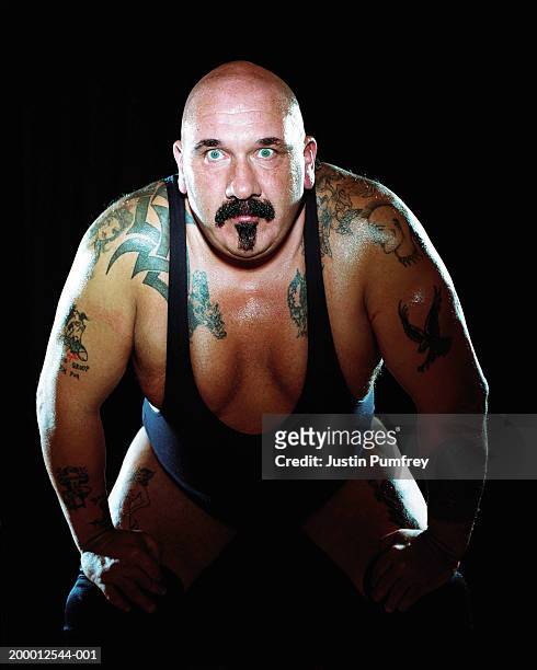 tattooed male wrestler, portrait - ソウルパッチ ストックフォトと画像