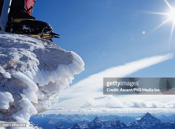 canada, alberta, mount temple, mountaineer on summit, low section - crampon stock pictures, royalty-free photos & images