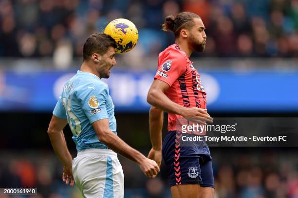Dominic Calvert-Lewin of Everton and Rodri during the Premier League match between Manchester City and Everton FC at Etihad Stadium on February 10,...