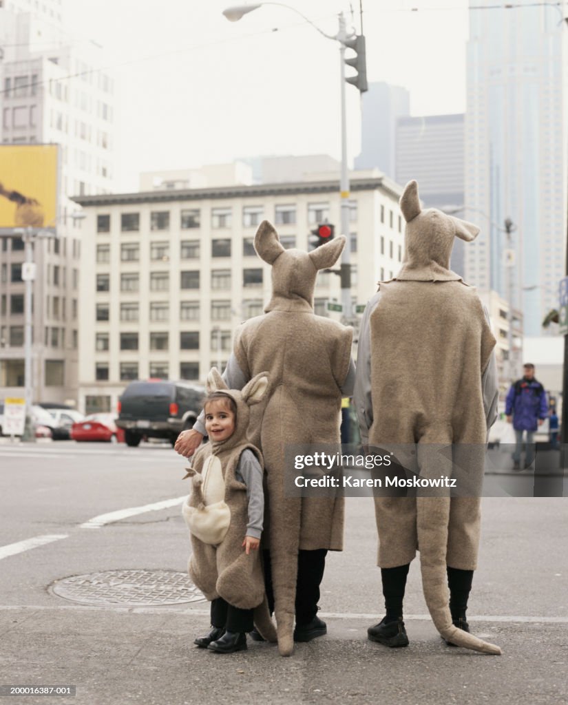 Family wearing kangaroo costumes, downtown Seattle, USA