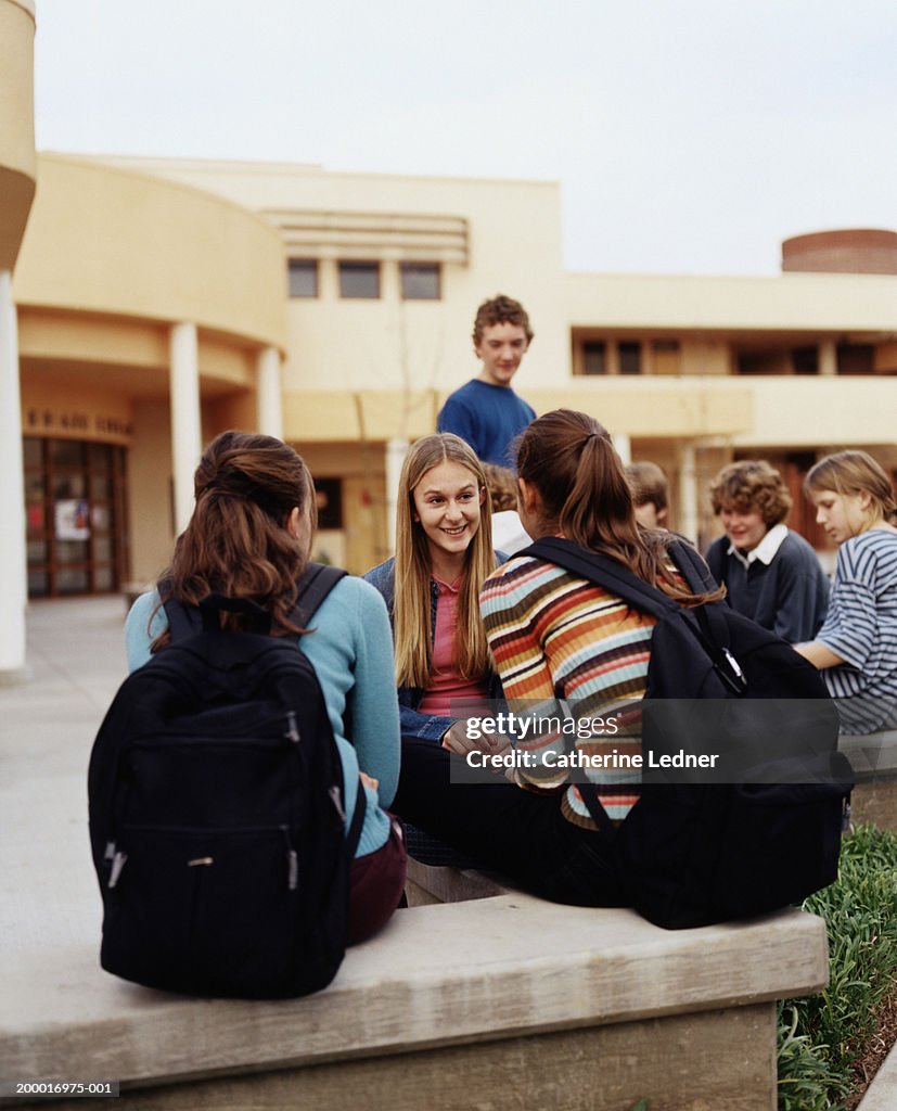 Teenagers (14-16) hanging around school during recess