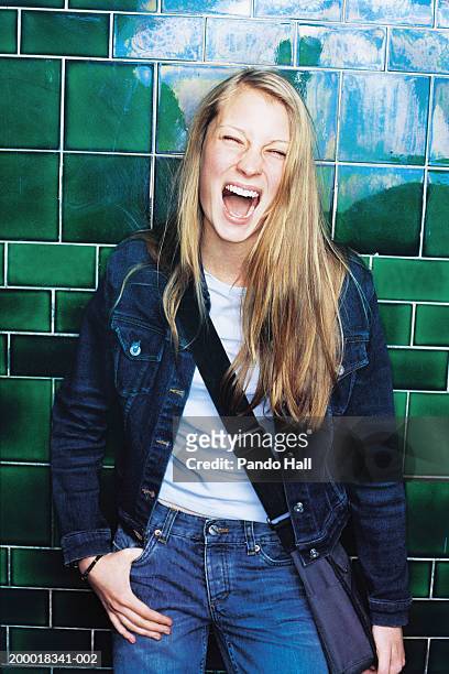 teenage girl (16-18) laughing, mouth open, portrait - 16 17 girl blond hair stock pictures, royalty-free photos & images