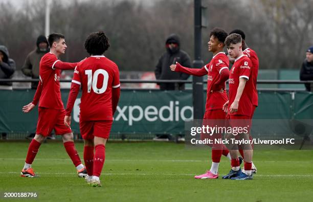 Trent Kone-Doherty of Liverpool celebrates scoring Liverpool's third goal with his team mates during the U18 Premier League game at AXA Training...
