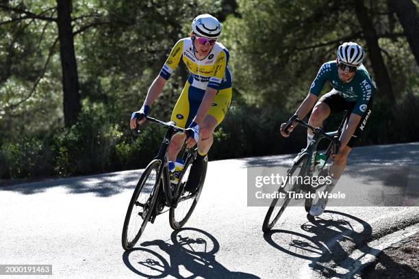 Vincent Van Hemelen of Belgium and Team Flanders - Baloise and Pau Miquel of Spain and Team Equipo Kern Pharma compete during the 40th Vuelta...