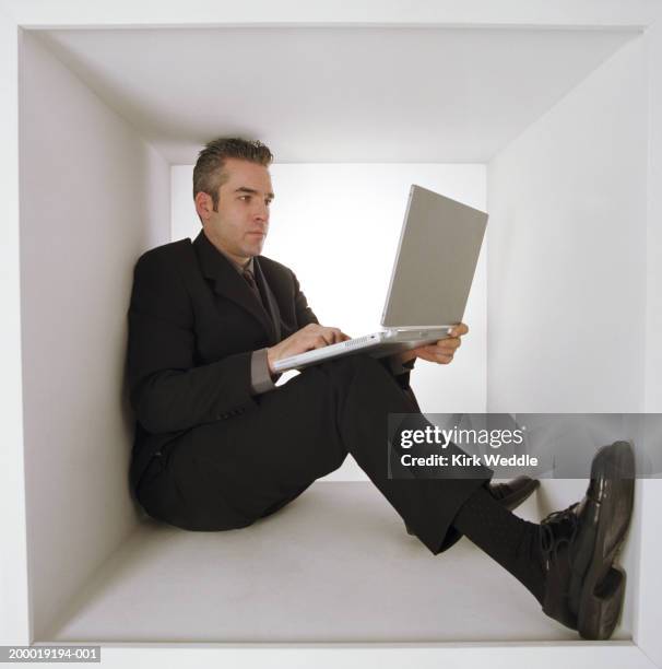 Working Inside Box 9,016 Man Inside Box Studio Stock Photos, High-Res Pictures, and Images ...