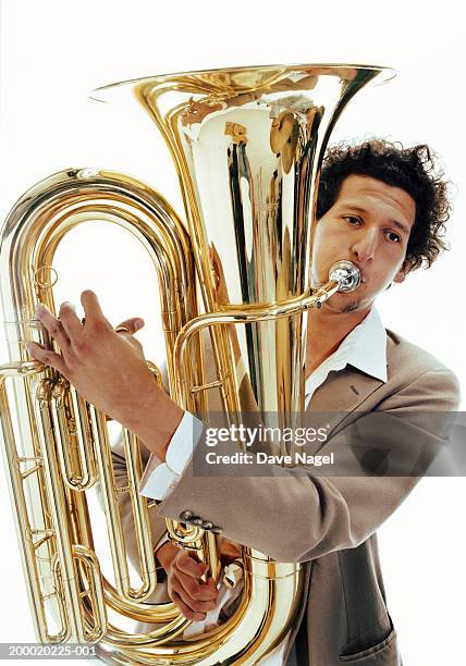 man playing euphonium - blechblasinstrument stock-fotos und bilder