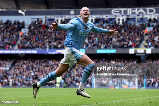 Erling Haaland of Manchester City celebrates scoring his team's first goal during the Premier League match between Manchester City and Everton FC at...