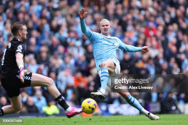 Erling Haaland of Manchester City scores his team's second goal past Jordan Pickford of Everton during the Premier League match between Manchester...