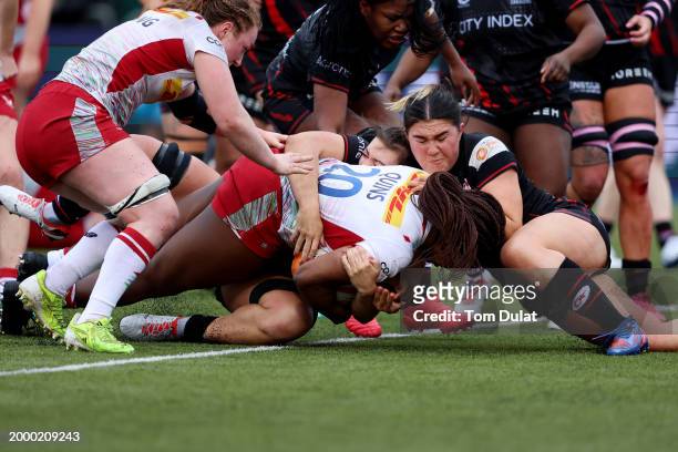 Nicole Wythe of Harlequins scores her team's third try during the Allianz Premiership Women's Rugby match between Saracens and Harlequins at StoneX...