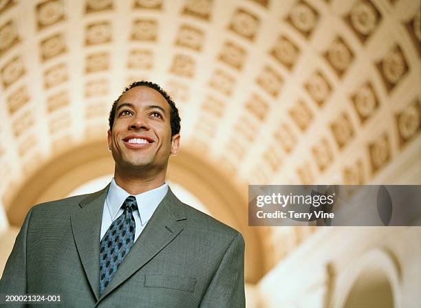 Man In Building 2,184 Man In Building Lobby Stock Photos, High-Res Pictures, and Images ...
