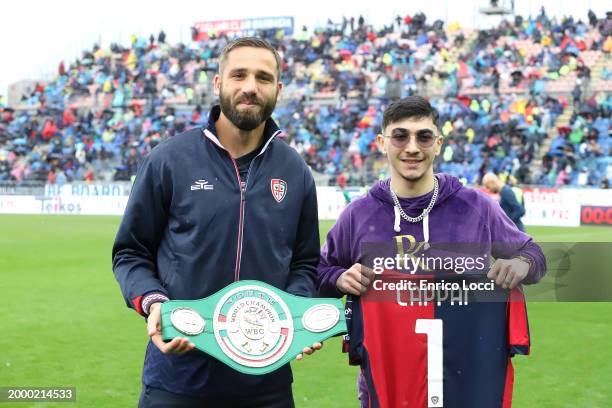 Leonardo Pavoletti of Cagliari and boxer Patrick Cappai during the Serie A TIM match between Cagliari and SS Lazio - Serie A TIM at Sardegna Arena on...