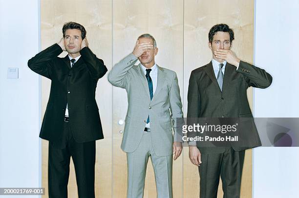 businessmen performing 'hear no evil, see no evil, speak no evil' - see no evil stock pictures, royalty-free photos & images