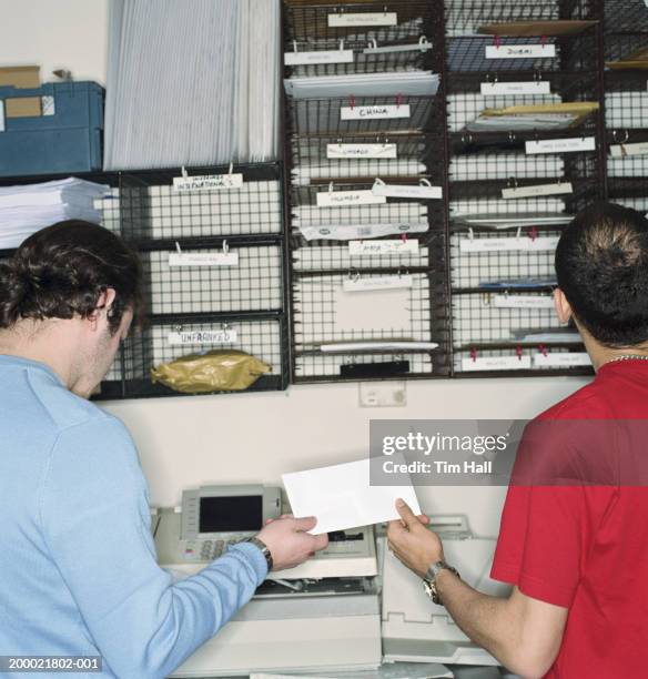 Sorting Mail Sign 2,775 Mail Sorting Office Stock Photos, High-Res Pictures, and Images ...