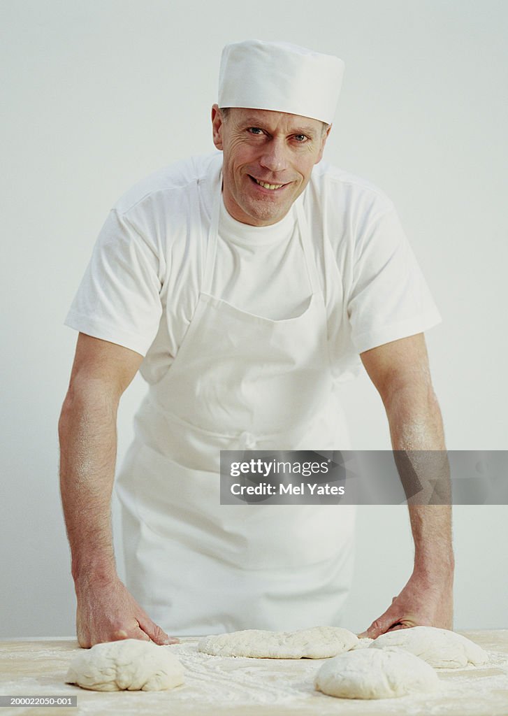 Male baker, smiling, portrait