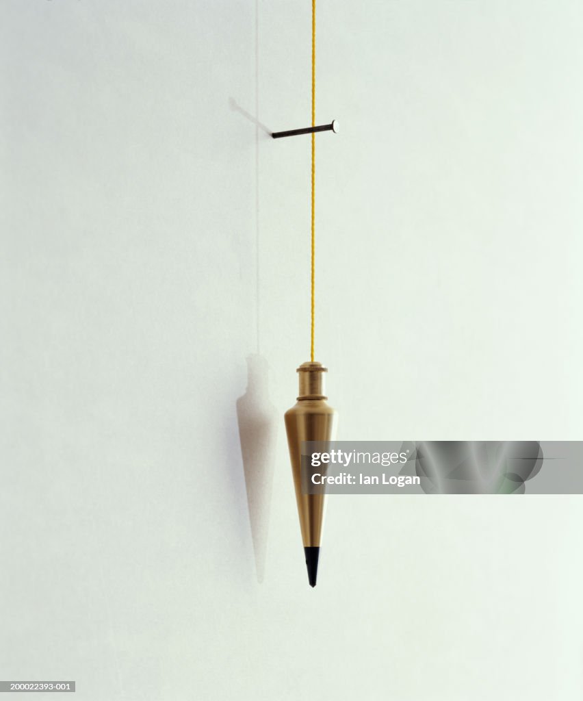 Weight String Leveling Weight On End Of String High-Res Stock Photo - Getty Images